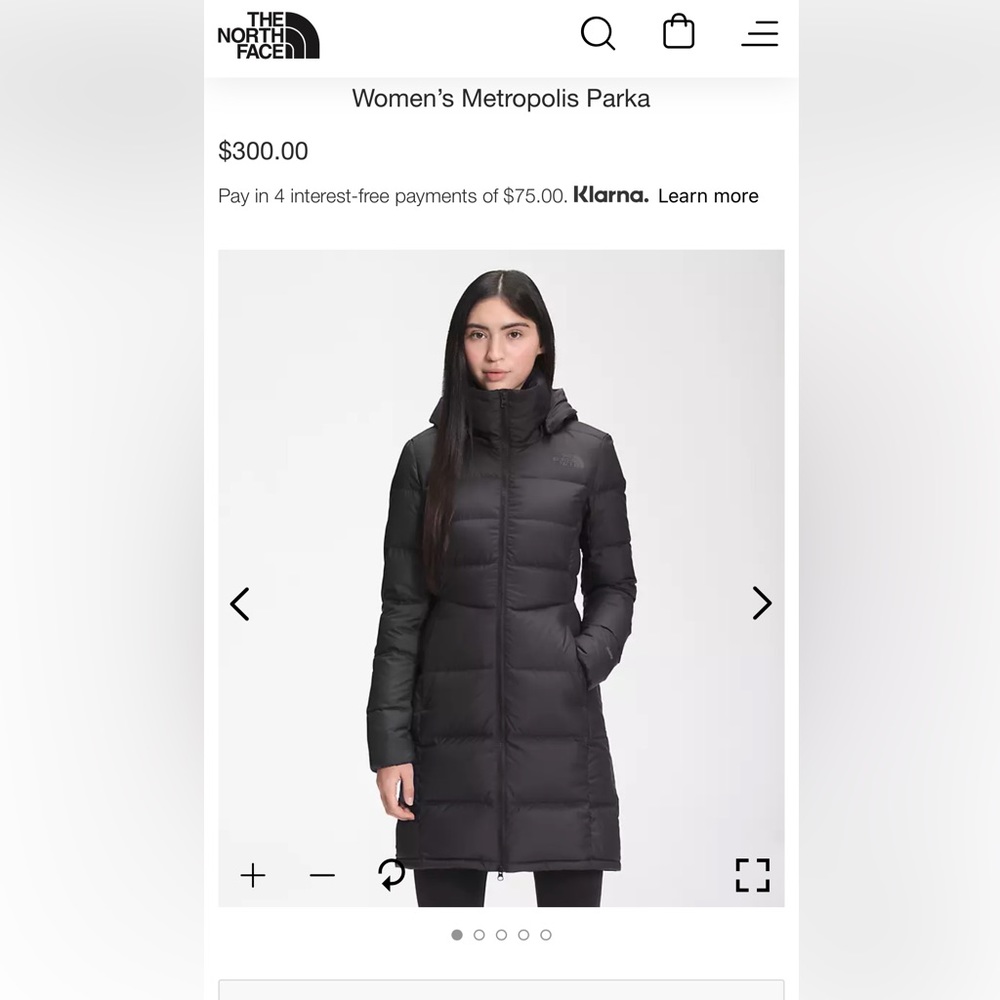 The North Face Women’s Metropolis Parka Black Size Large but is slim fitting.